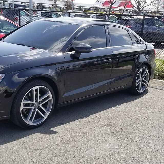 black audi with window tint