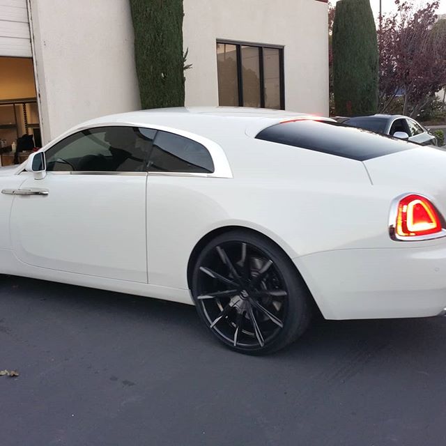 White bently with window tint