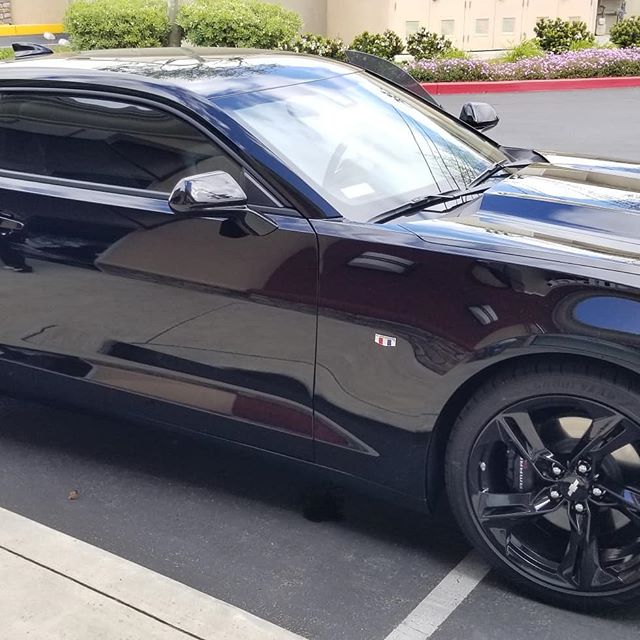 Black maserati with window tint