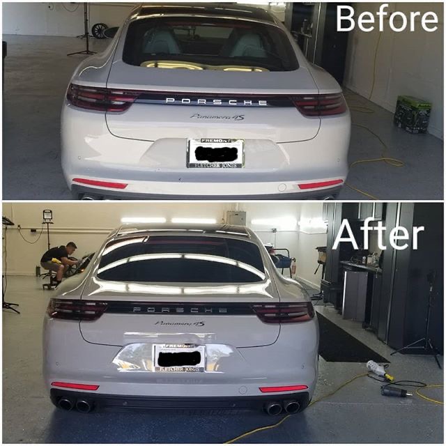 white porsche with window tint and smoked headlights