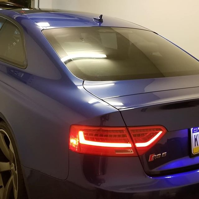 blue audi with window tint